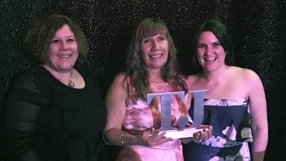 Sarah Baker, Hayley Khan and Alison Humphries receiving the gold award